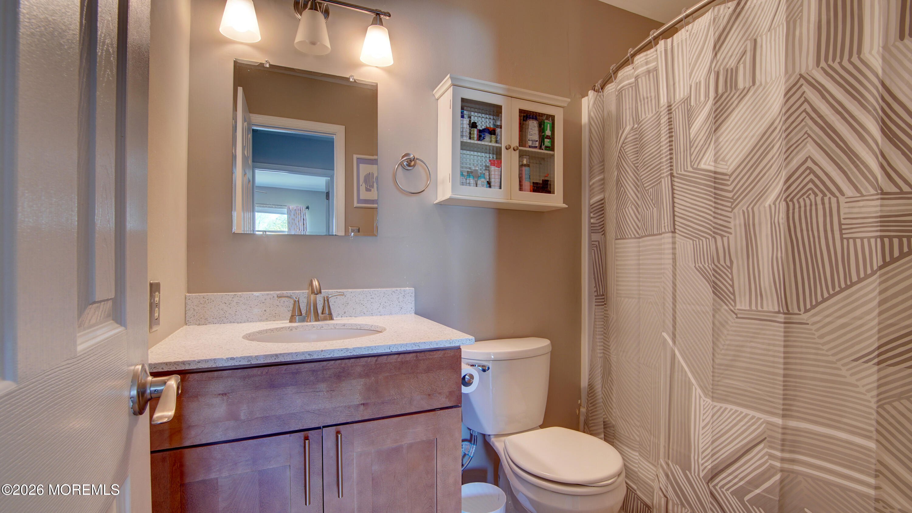 128 Starlight Road Howell, NJ 07731 - Photo 23 of 36 a bathroom with a sink toilet and shower