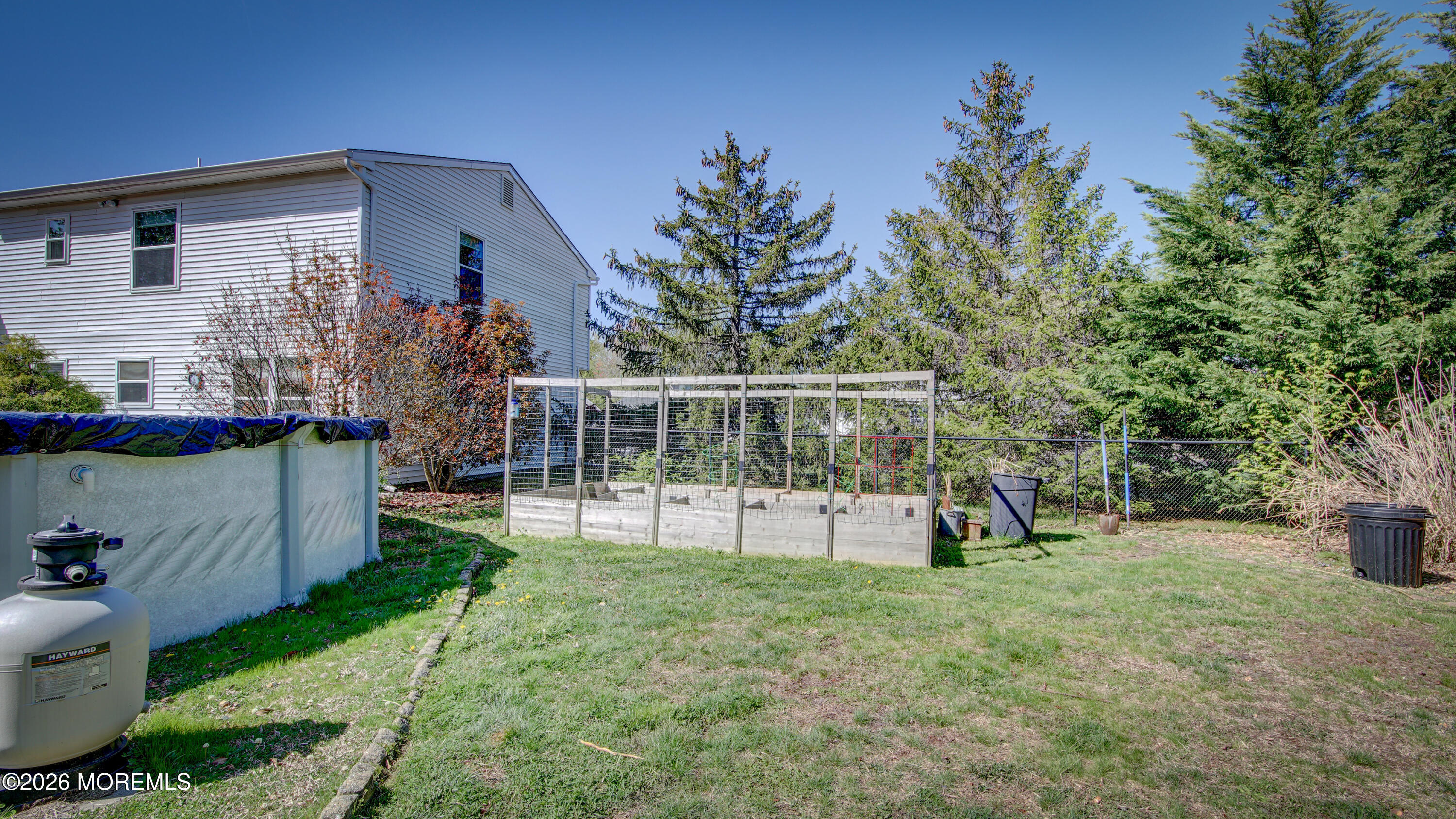 128 Starlight Road Howell, NJ 07731 - Photo 28 of 36 a view of a house with backyard and sitting area