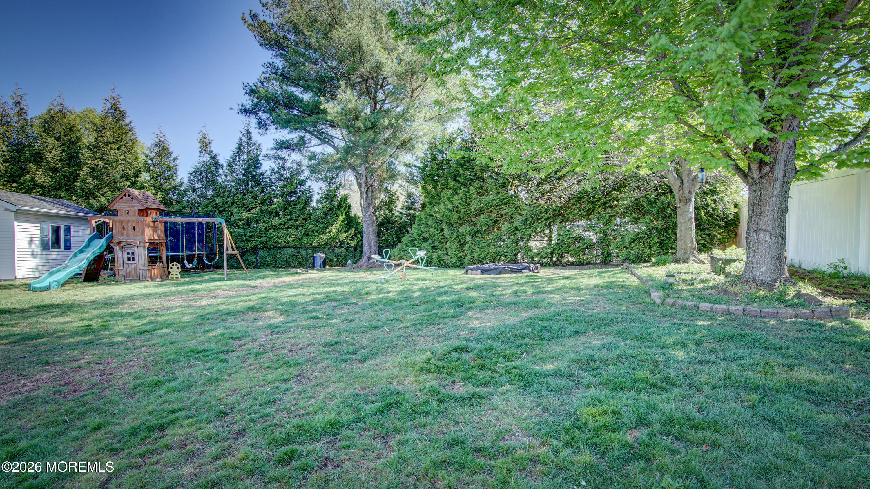 128 Starlight Road Howell, NJ 07731 - Photo 29 of 36 a view of house with yard and entertaining space
