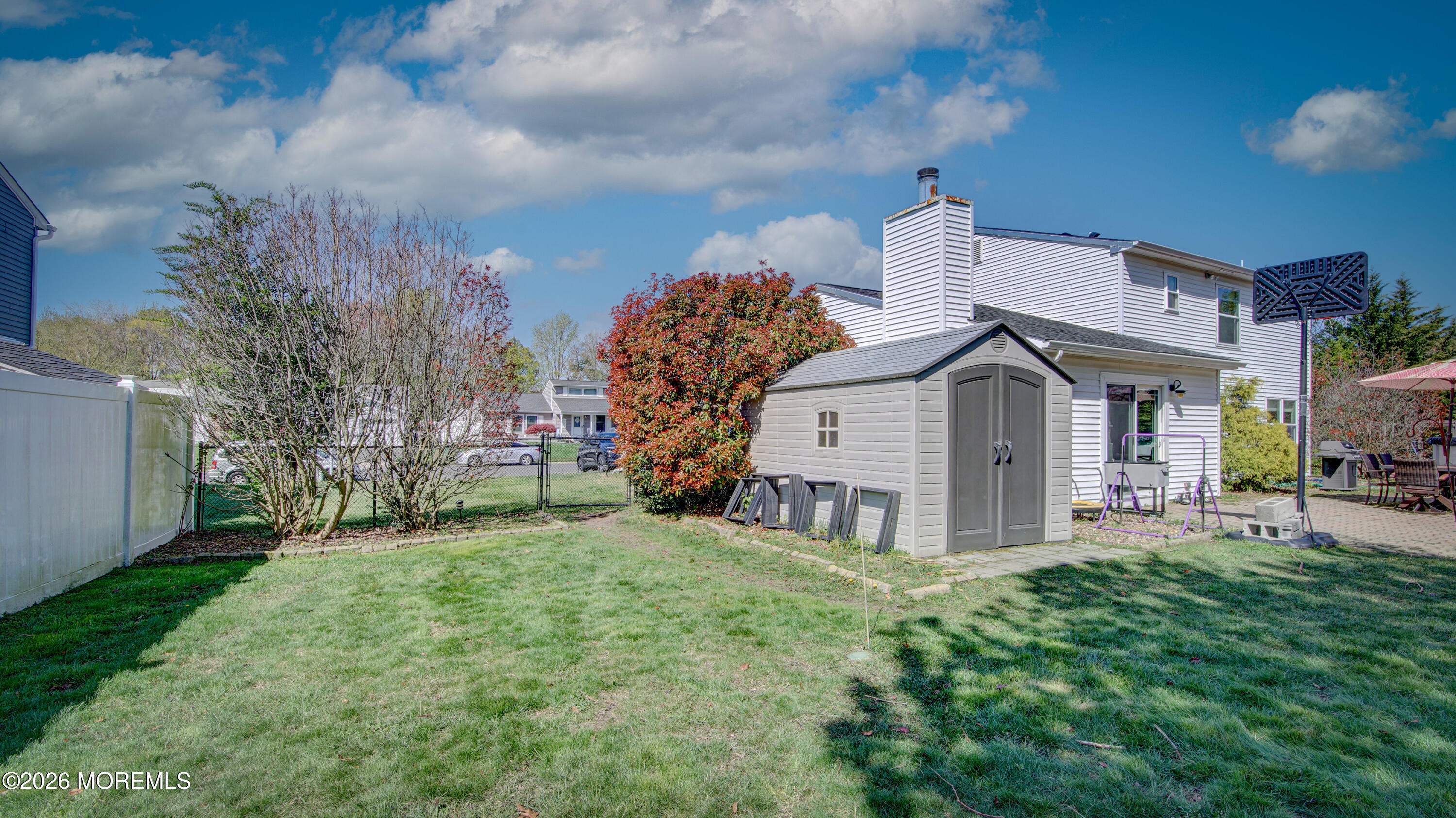 128 Starlight Road Howell, NJ 07731 - Photo 30 of 36 a view of a house with a yard and pathway