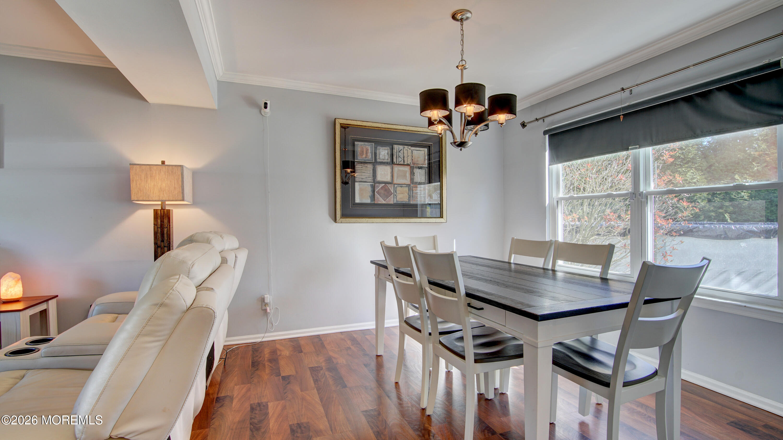 128 Starlight Road Howell, NJ 07731 - Photo 7 of 36 a view of a dining room with furniture window and wooden floor