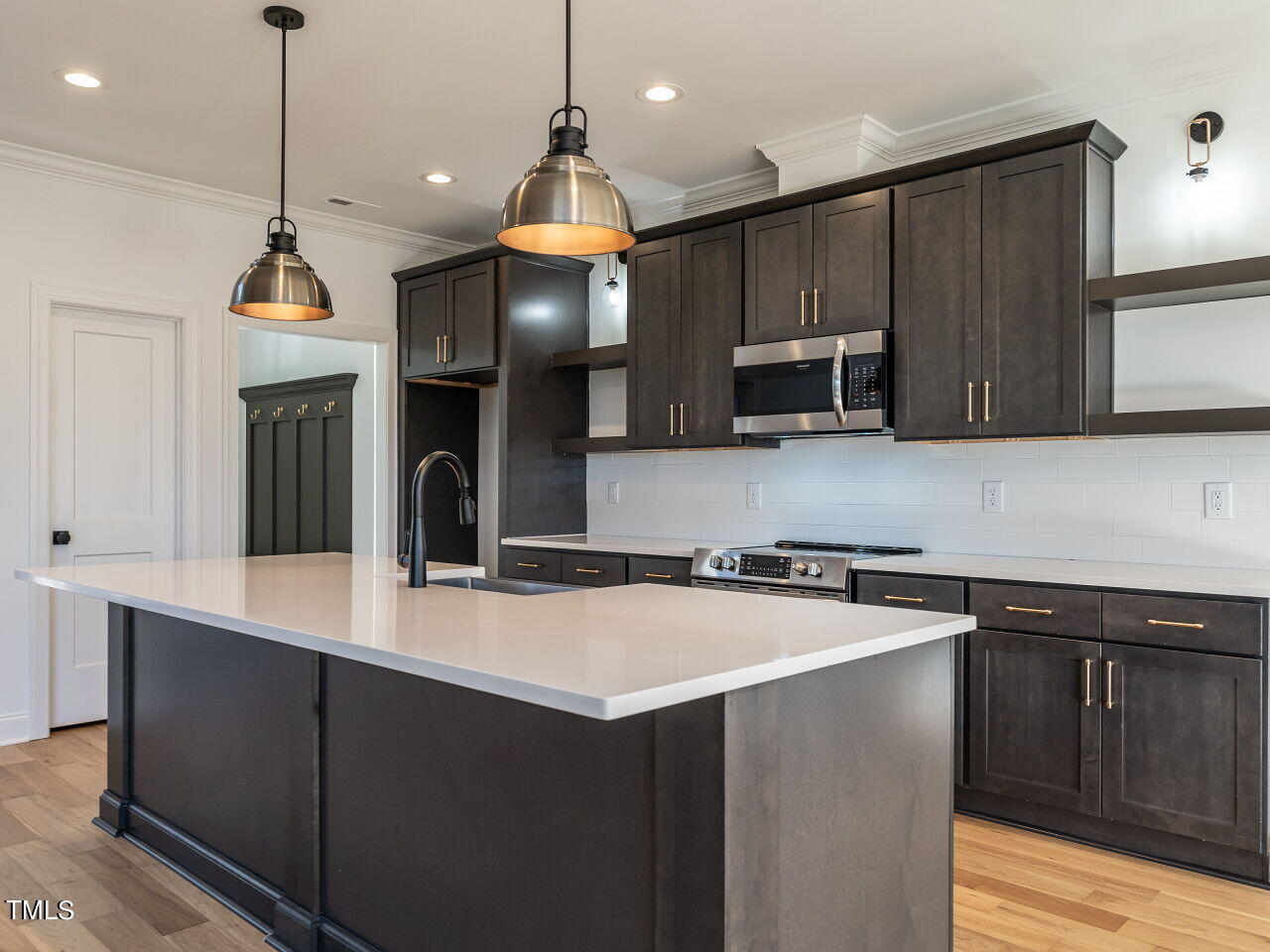 45 Tamaran Ct Spring Spring Hope, NC 27882 - Photo 12 of 37 a kitchen that has a sink a stove and cabinets
