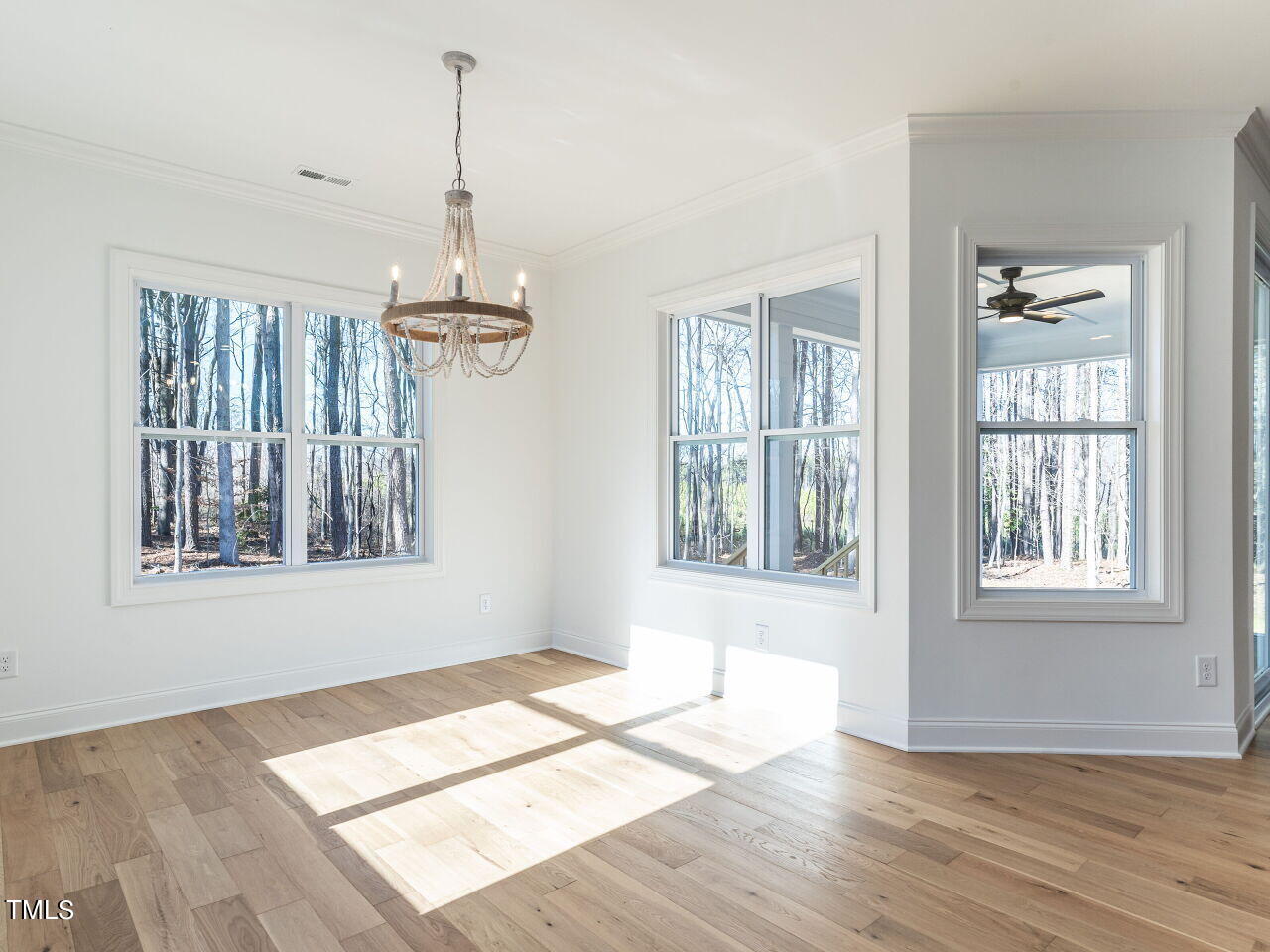 45 Tamaran Ct Spring Spring Hope, NC 27882 - Photo 15 of 37 a view of an empty room with wooden floor and a window