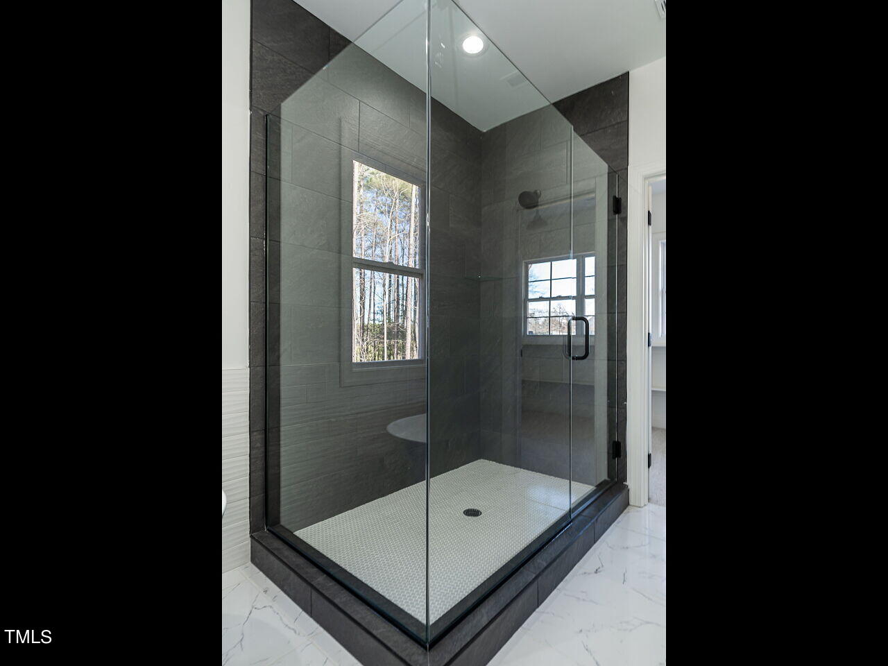 45 Tamaran Ct Spring Spring Hope, NC 27882 - Photo 24 of 37 a bathroom with a tub and shower