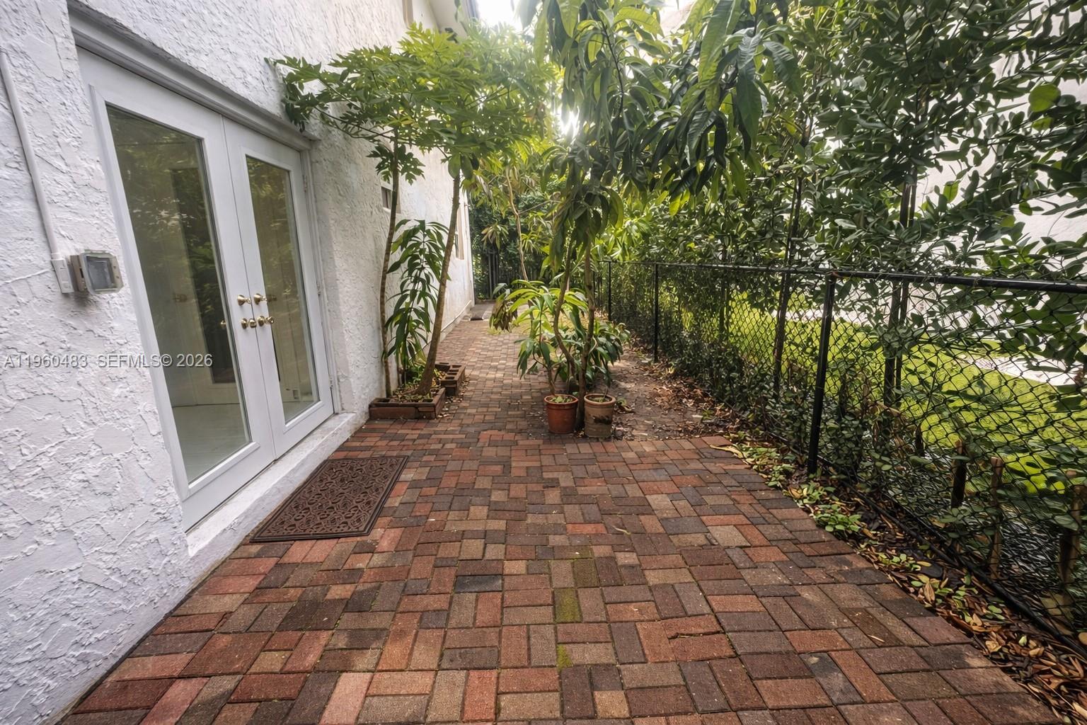 3614 Anderson Road Coral Gables, FL 33134 - Photo 8 of 25 a view of a pathway of a house