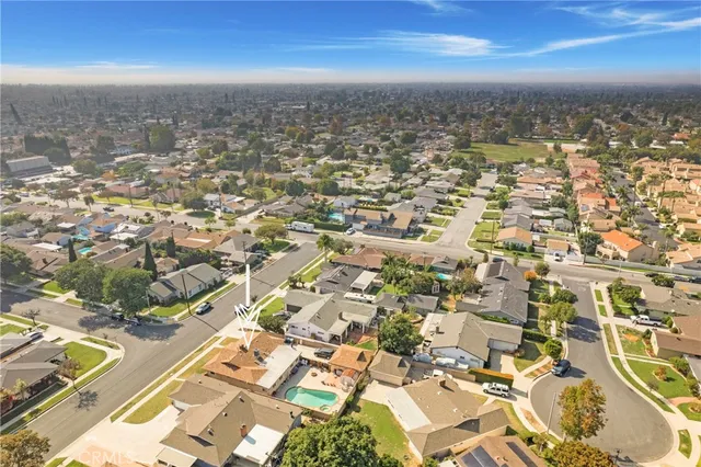 an aerial view of residential building with parking space