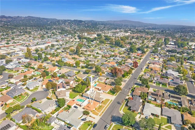 an aerial view of residential building with parking space