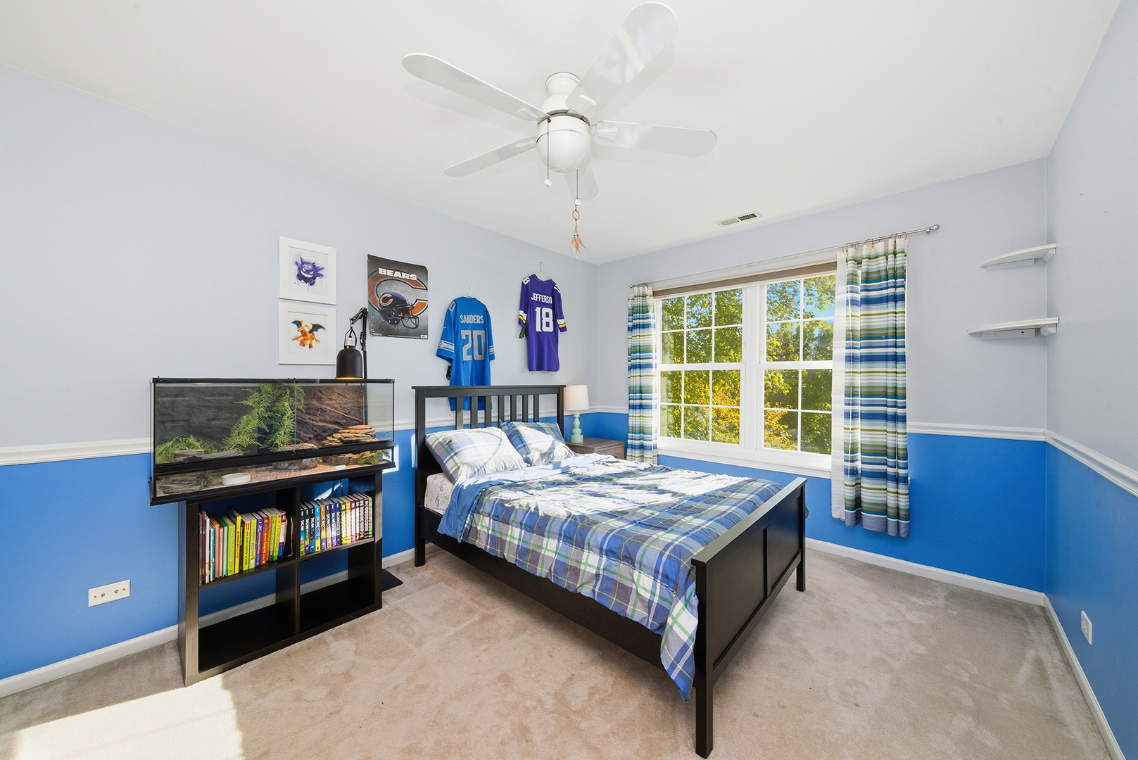 1461 Waterside Drive Bolingbrook, IL 60490 - Photo 15 of 26 a bedroom with a bed dresser and a window