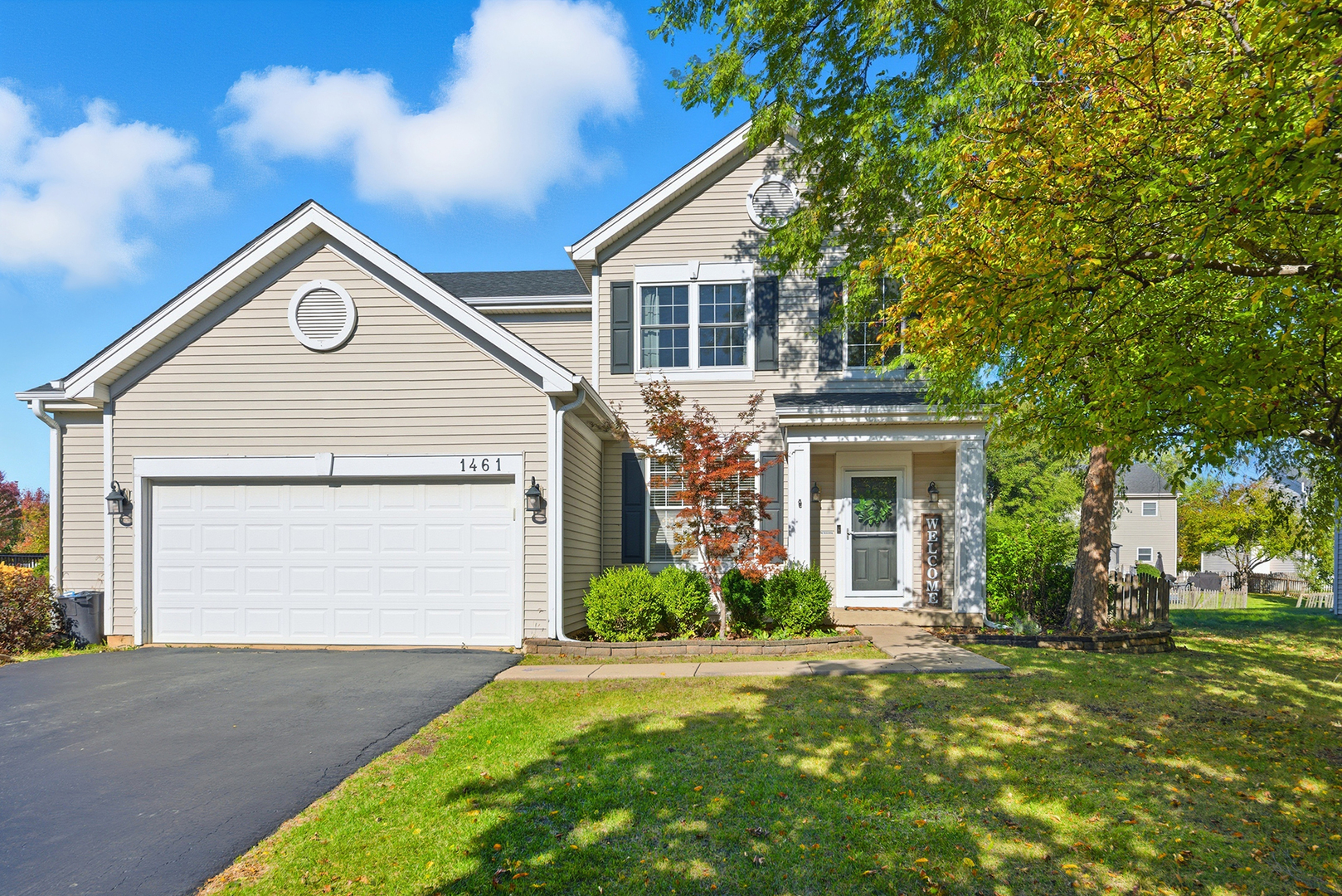 1461 Waterside Drive Bolingbrook, IL 60490 - Photo 2 of 26 a view of a house with yard and plants