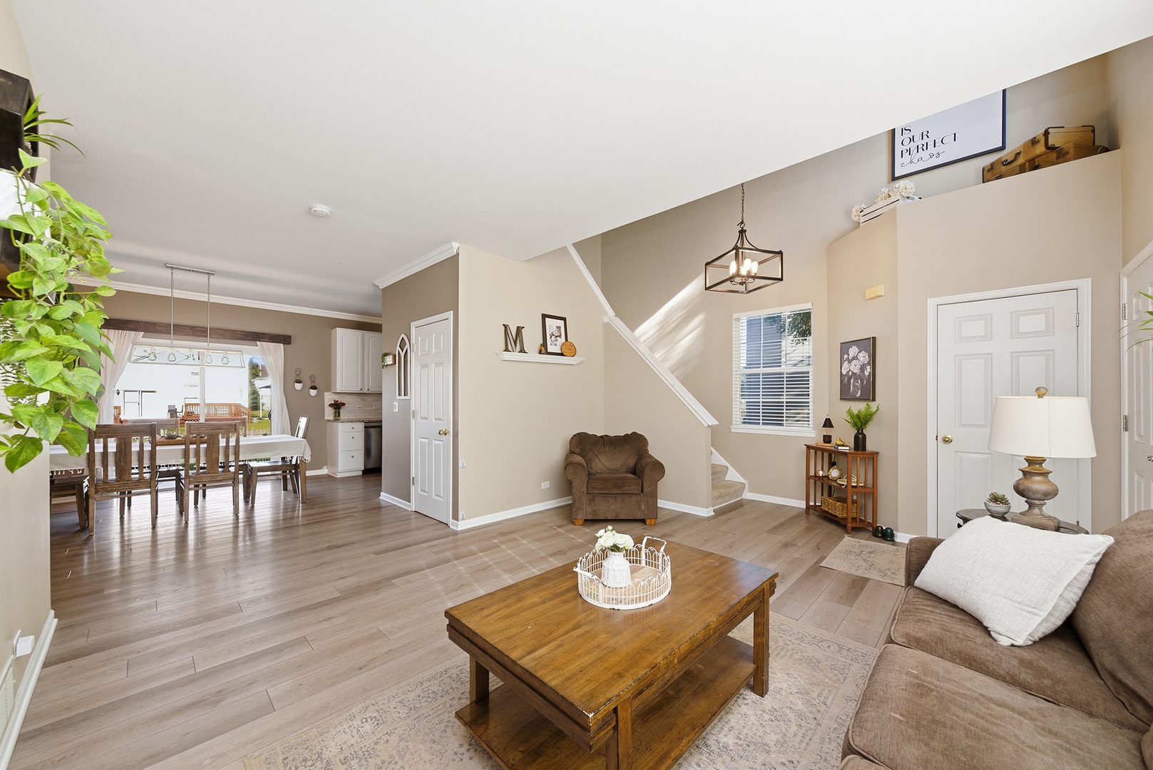 1461 Waterside Drive Bolingbrook, IL 60490 - Photo 5 of 26 a living room with furniture and wooden floor