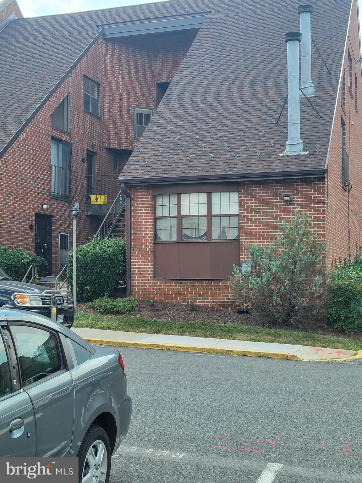 3020 Pineview Court Northeast, Unit 3020 Washington, DC 20018 - Photo 2 of 4 a view of a house with a swimming pool