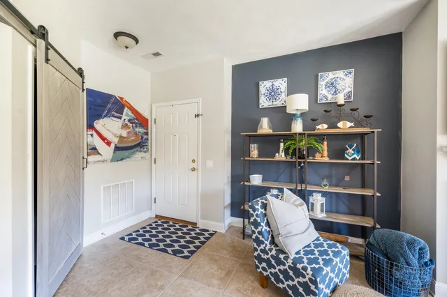 a view of a room with porch and furniture