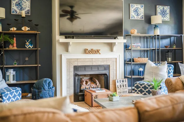 a bedroom with furniture and a window