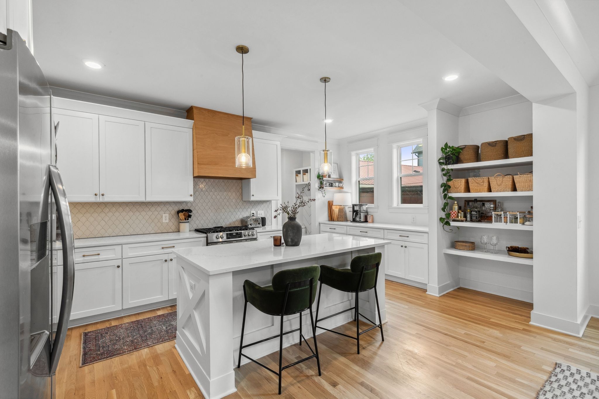 423 A American Road Nashville, TN 37209 - Photo 13 of 47 a kitchen with stainless steel appliances granite countertop a sink stove and refrigerator