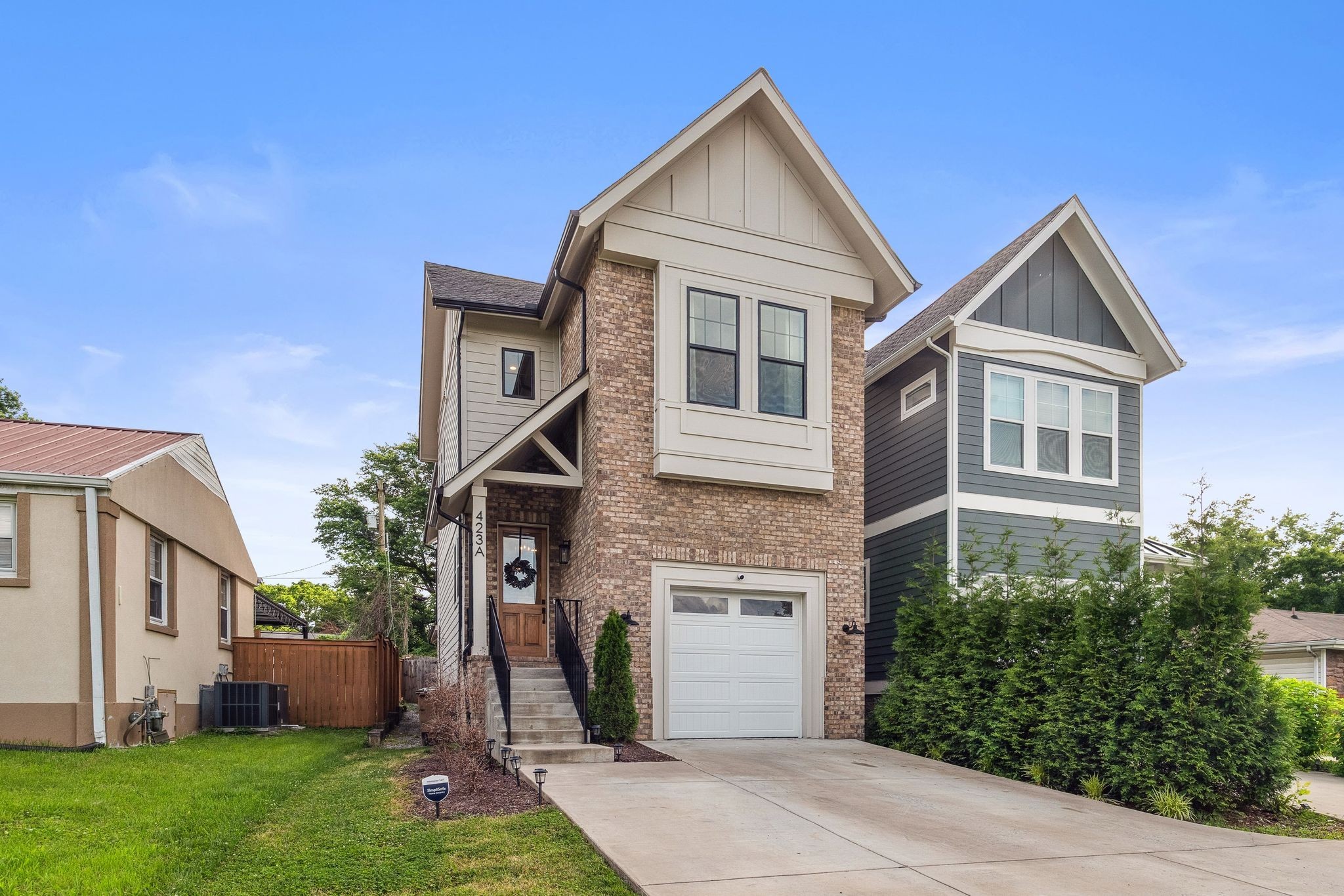 423 A American Road Nashville, TN 37209 - Photo 2 of 47 a front view of a house with a yard