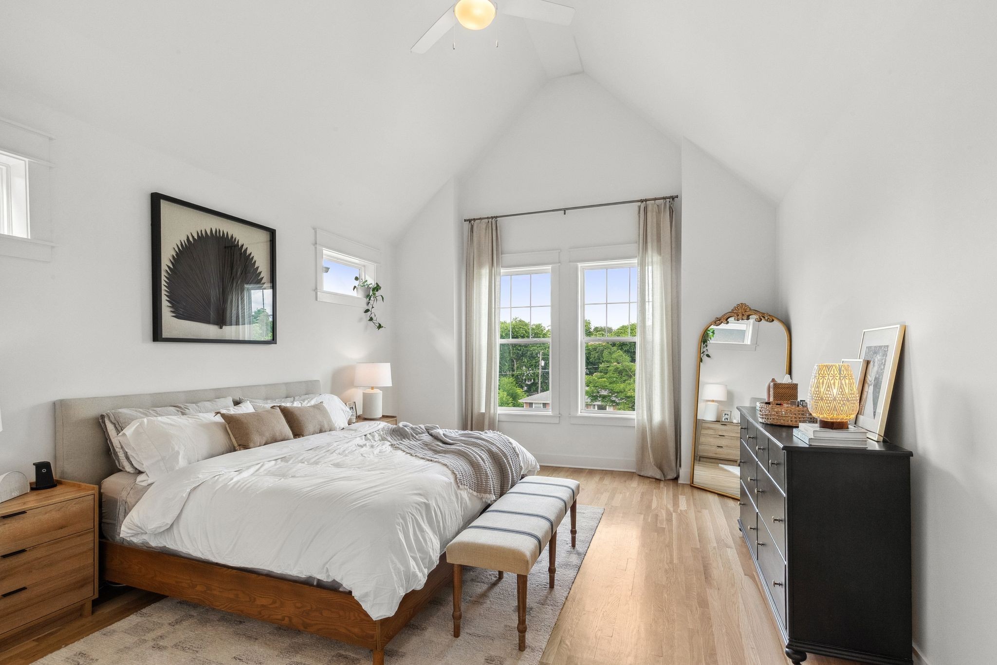 423 A American Road Nashville, TN 37209 - Photo 24 of 47 a bedroom with a bed large window with lamp and windows