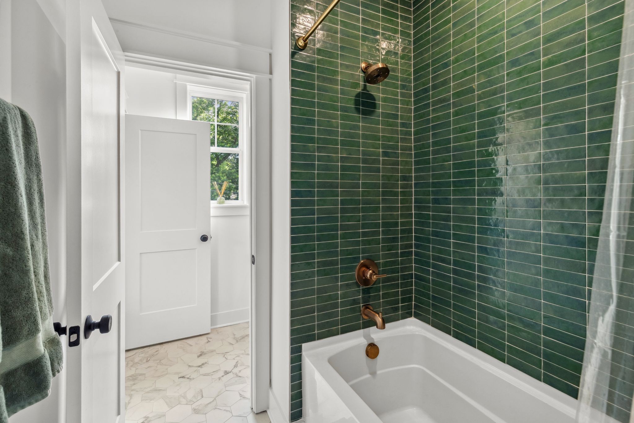 423 A American Road Nashville, TN 37209 - Photo 37 of 47 a bathroom with a bathtub and shower