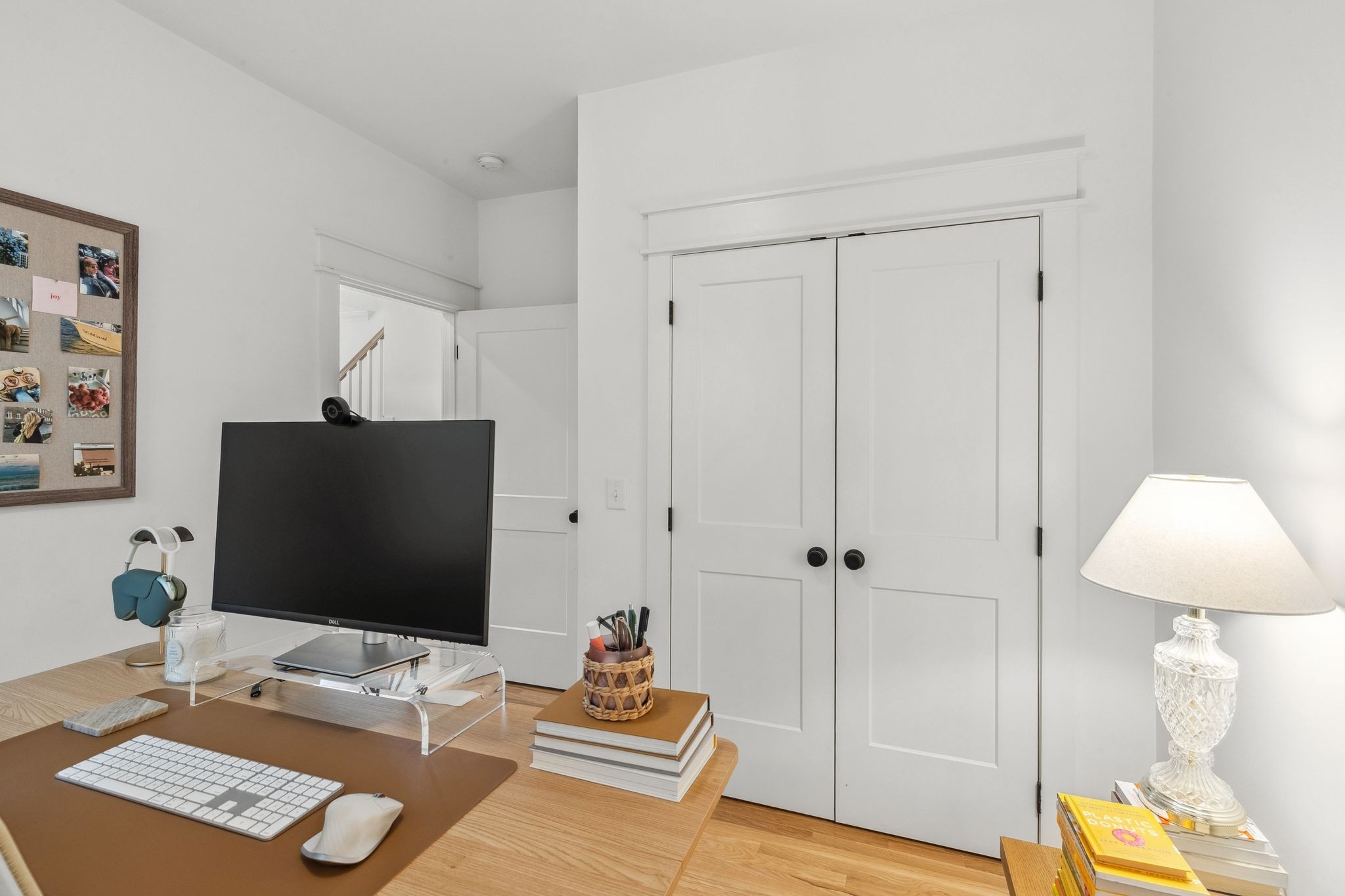 423 A American Road Nashville, TN 37209 - Photo 7 of 47 a desktop computer sitting on top of a desk and chair with wooden floor