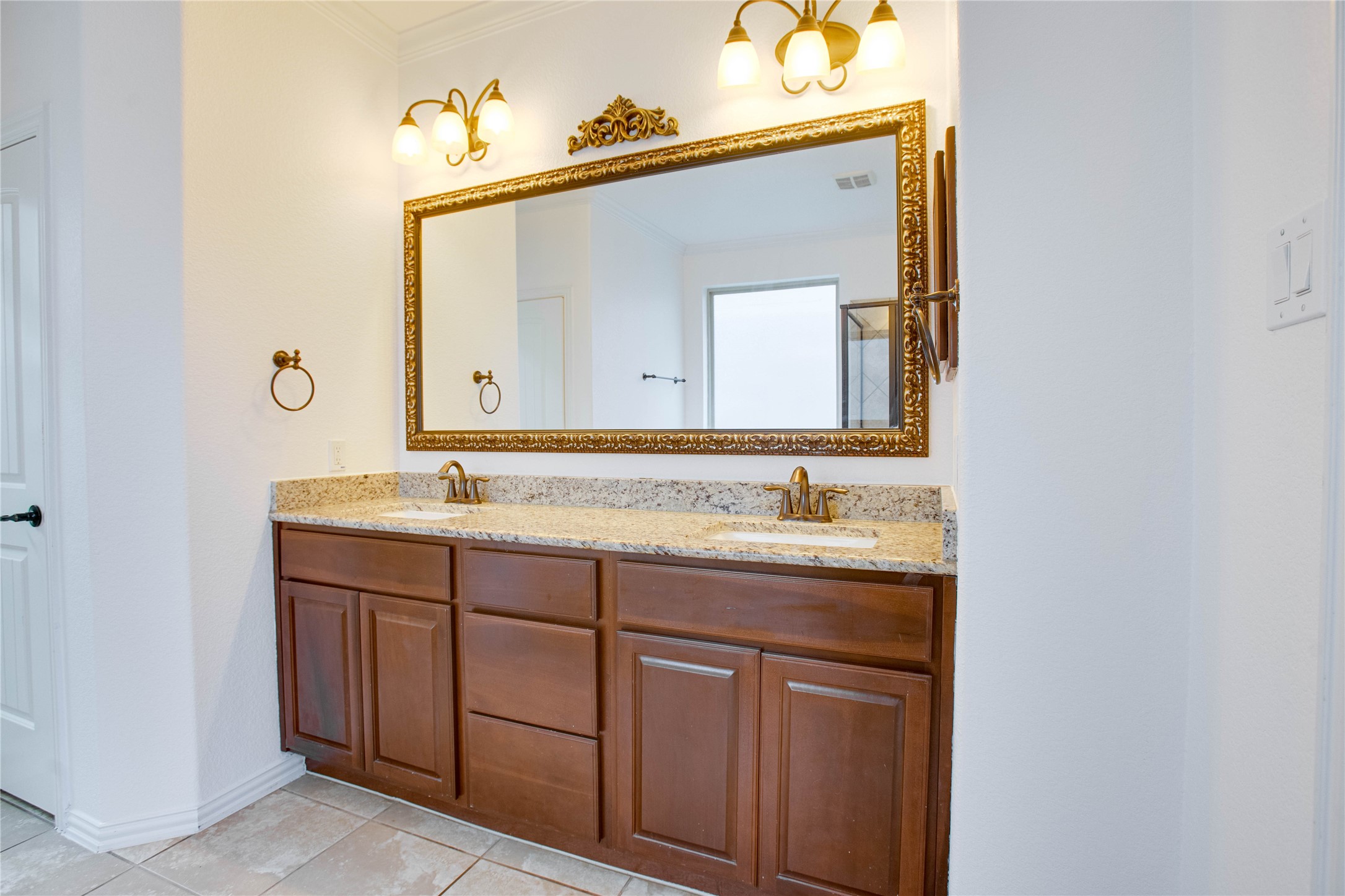 6210 Pinewood Heights Drive Spring, TX 77389 - Photo 15 of 24 a bathroom with a double vanity sink and a mirror