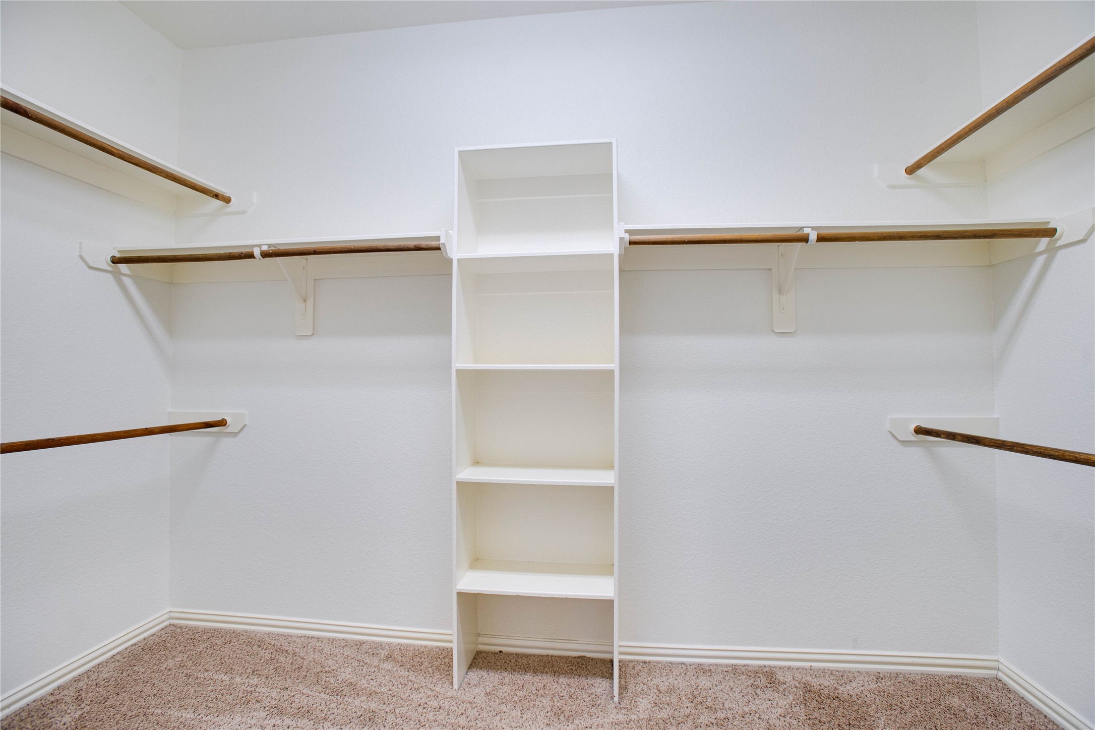 6210 Pinewood Heights Drive Spring, TX 77389 - Photo 17 of 24 a view of an empty walk in closet