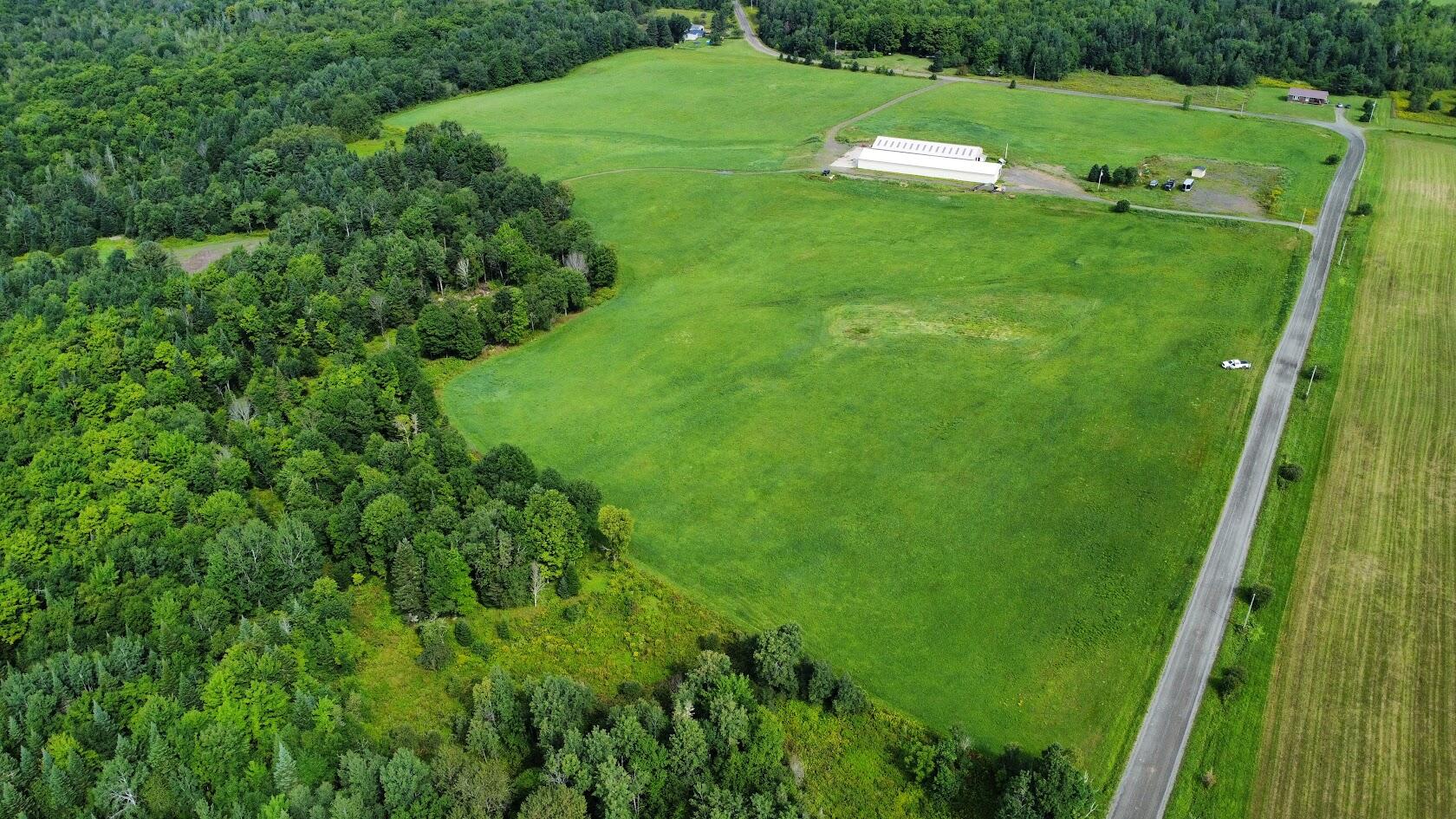 176 Rebel Hill Road Merrill, ME 04780 - Photo 11 of 29 dji_fly_20240806_095354_423_172295247908