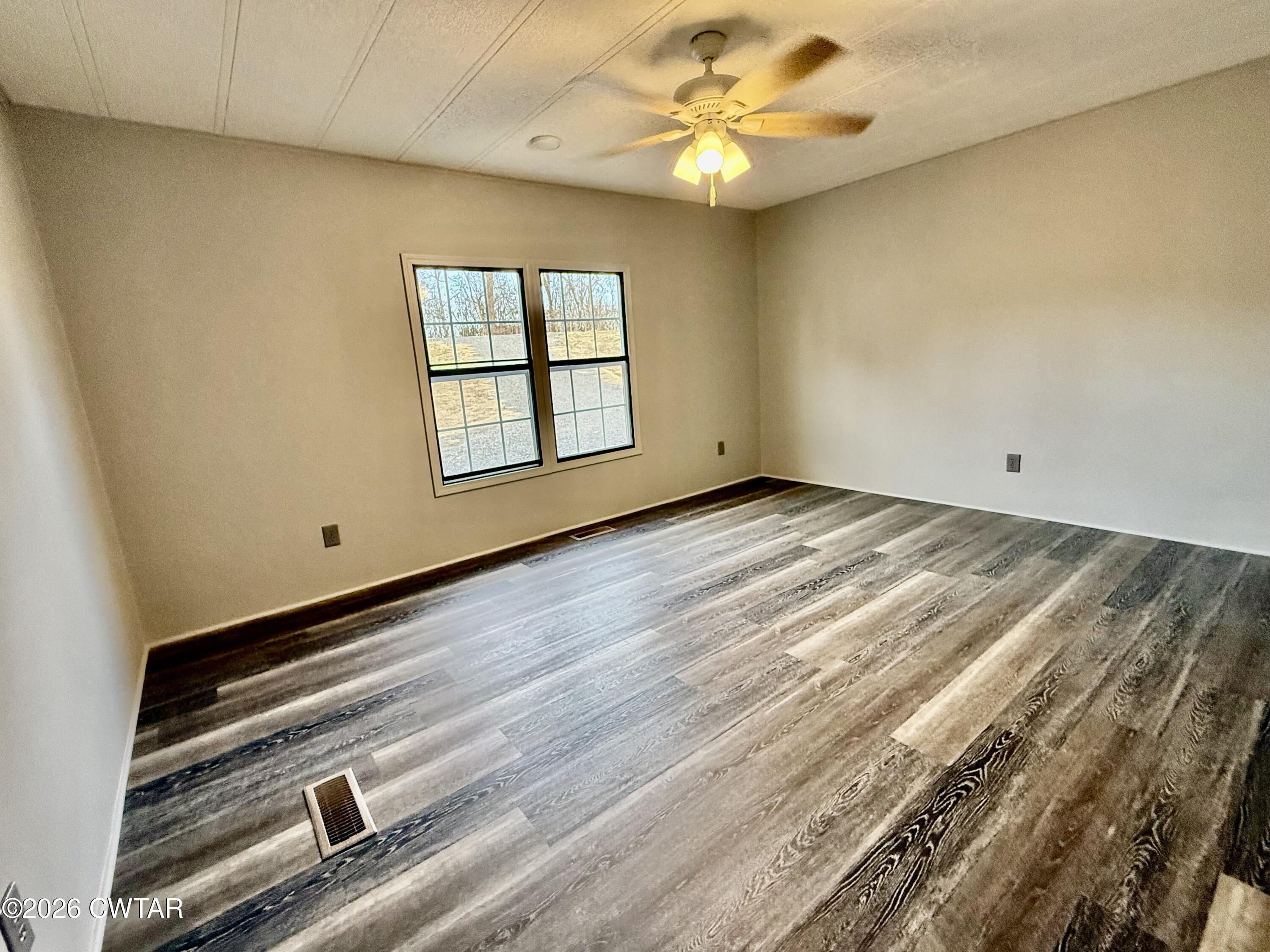 0 Antioch Church Road Hornbeak, TN 38232 - Photo 12 of 18 a view of an empty room with a window
