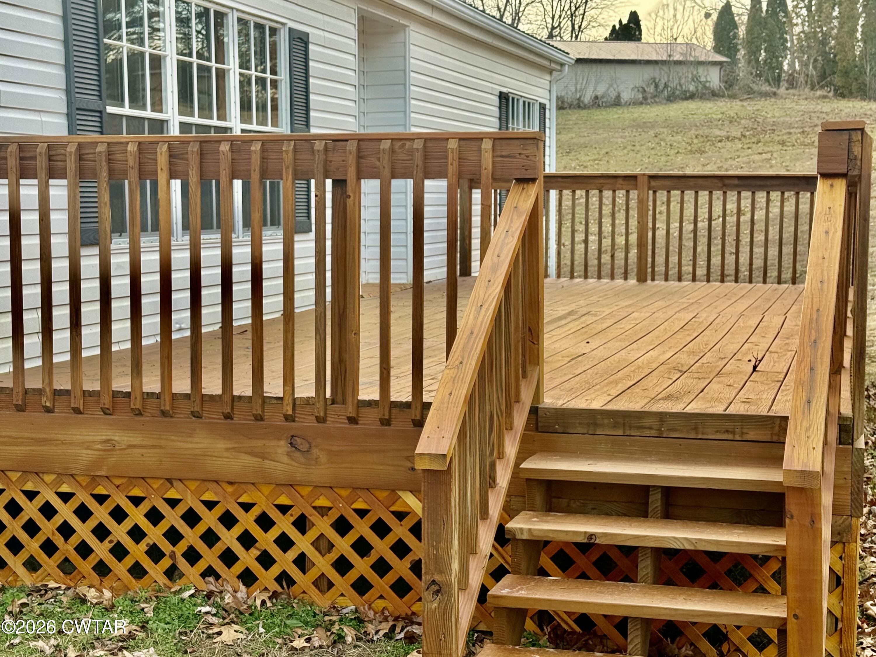 0 Antioch Church Road Hornbeak, TN 38232 - Photo 16 of 18 a view of a balcony with wooden fence