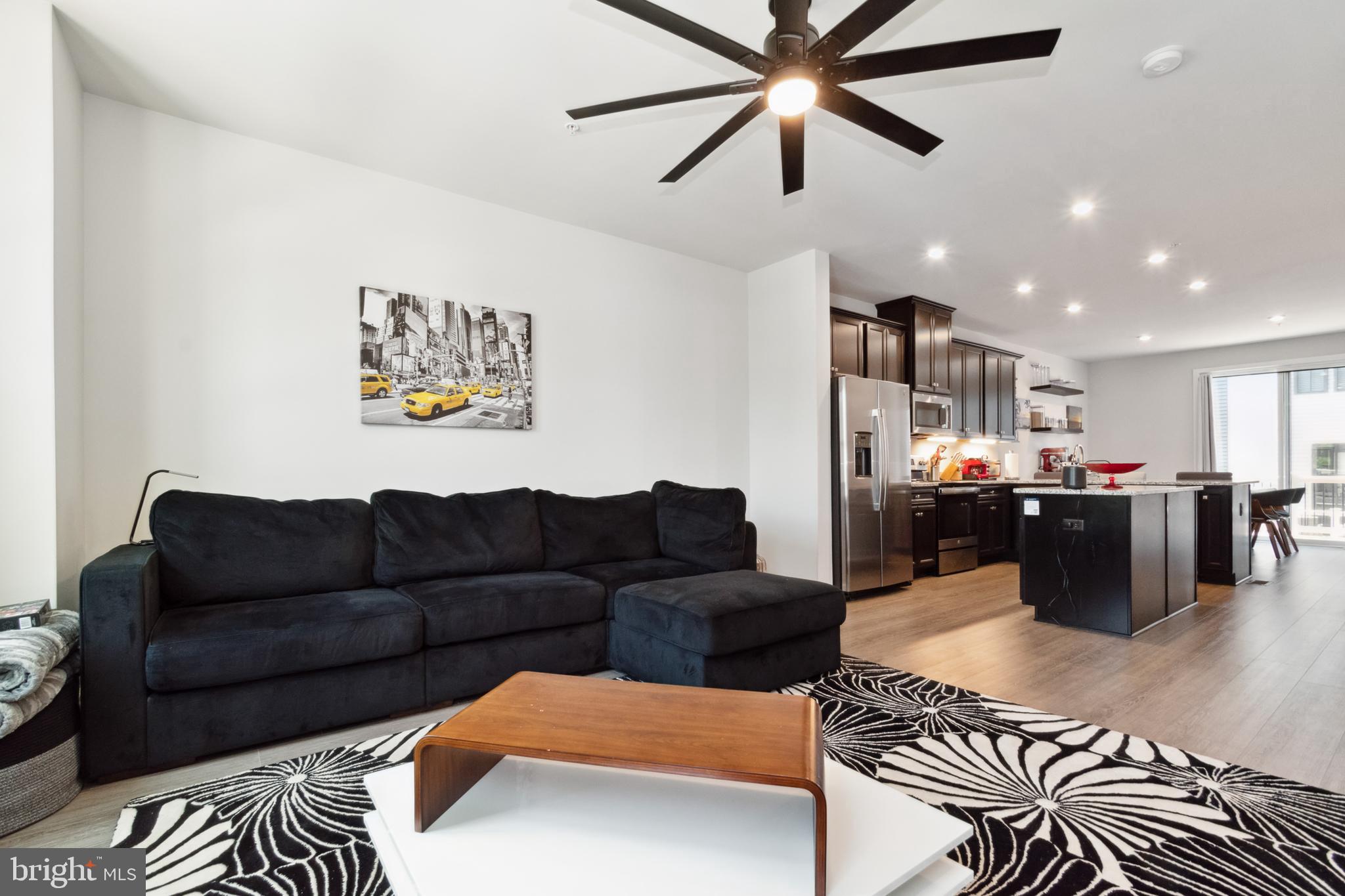 7107 Sollers Point Road Dundalk, MD 21222 - Photo 14 of 25 a living room with furniture kitchen view and a window