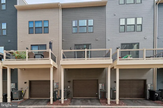 a view of building with a window and a tree