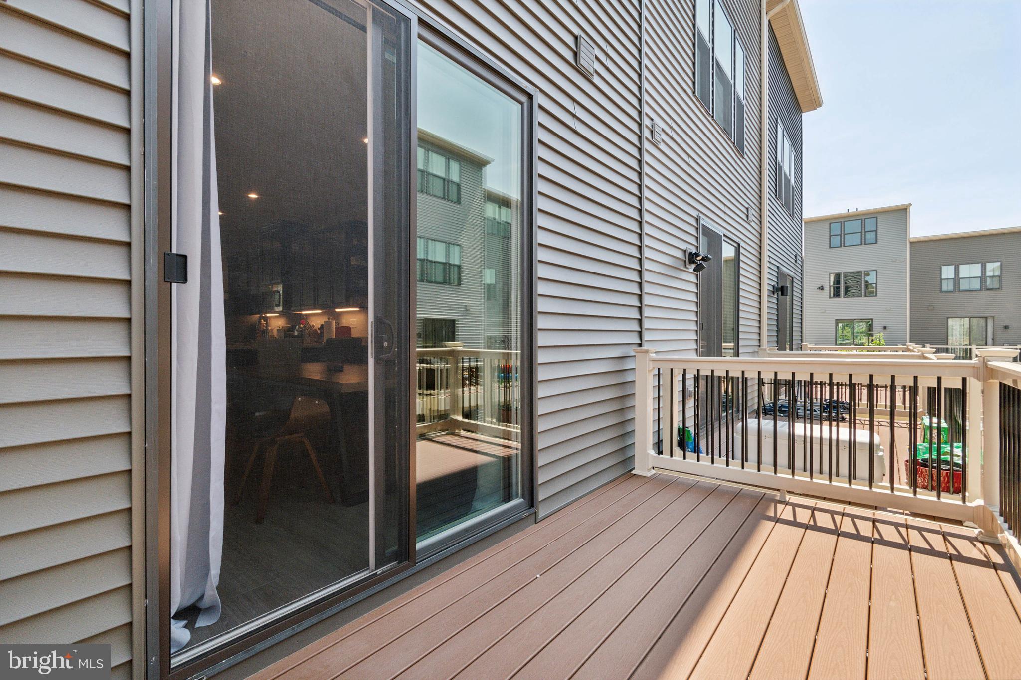 7107 Sollers Point Road Dundalk, MD 21222 - Photo 10 of 25 a view of a balcony with wooden floor