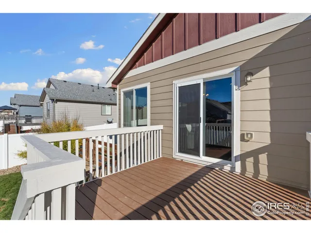 a view of balcony with wooden floor