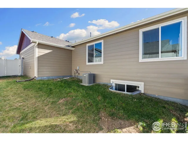 a house view with a backyard space