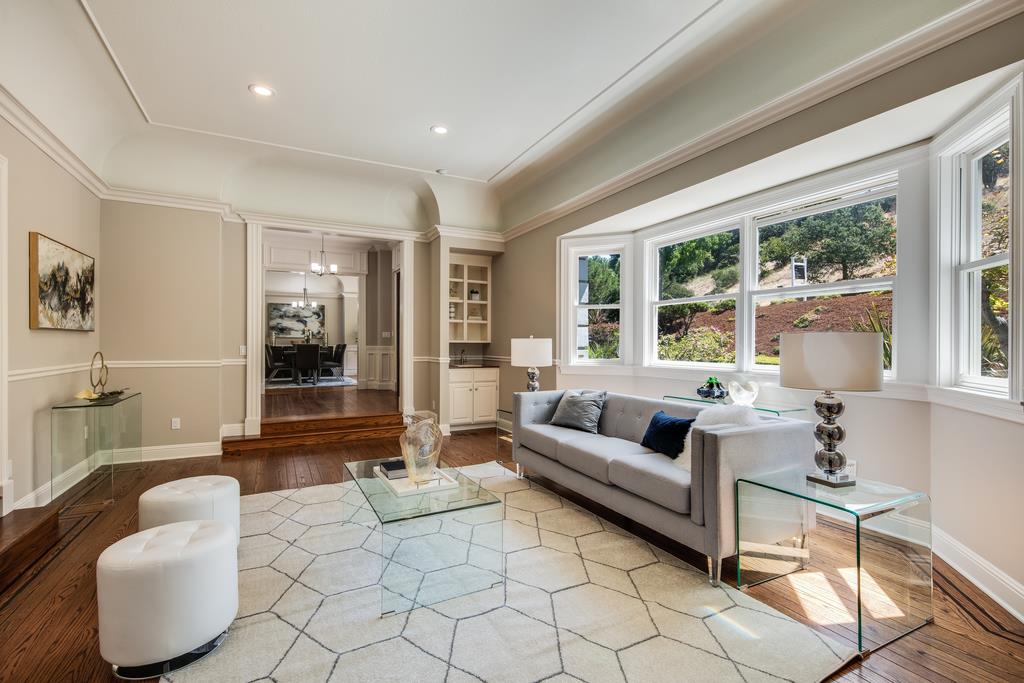 12385 Parker Ranch Road Saratoga, CA 95070 - Photo 11 of 50 a living room with furniture and a large window