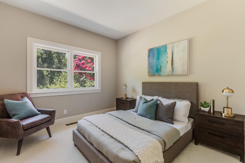 12385 Parker Ranch Road Saratoga, CA 95070 - Photo 33 of 50 a bedroom with bed and a couch