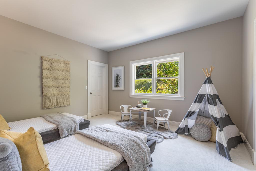 12385 Parker Ranch Road Saratoga, CA 95070 - Photo 35 of 50 a bedroom with bed and a window