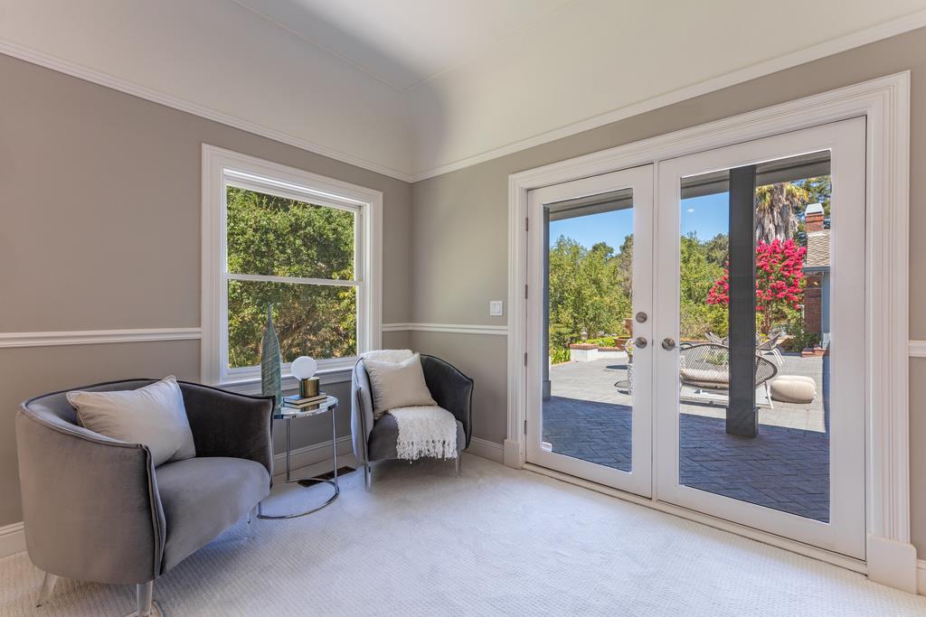 12385 Parker Ranch Road Saratoga, CA 95070 - Photo 50 of 50 a living room with furniture and a window