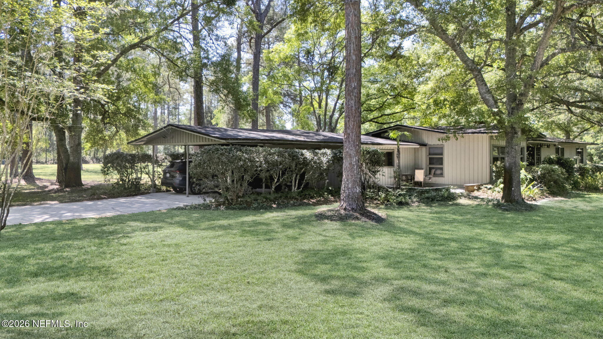 4821 Reed Avenue Jacksonville, FL 32257 - Photo 32 of 49 Carport and side yard