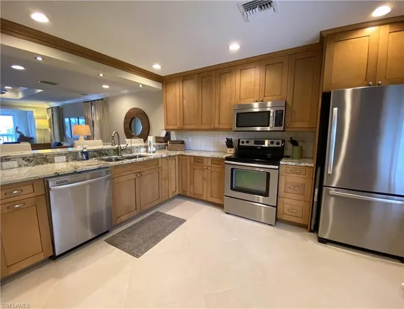 $11,000 | 9101 Vanderbilt Drive, Unit 304, Naples, FL 34108