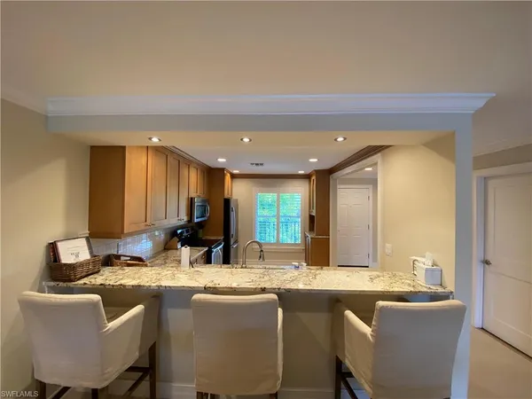 $11,000 | 9101 Vanderbilt Drive, Unit 304, Naples, FL 34108