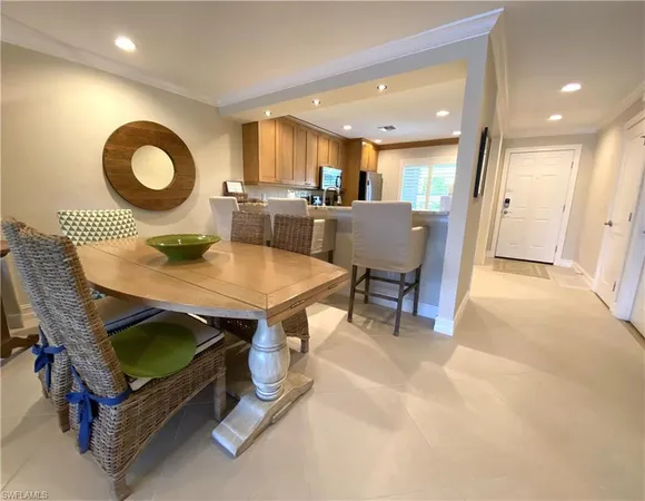 $11,000 | 9101 Vanderbilt Drive, Unit 304, Naples, FL 34108