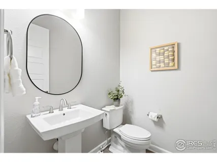 a spacious bedroom with a bed and window