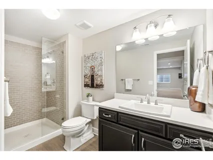 a view of living room with furniture and a rug