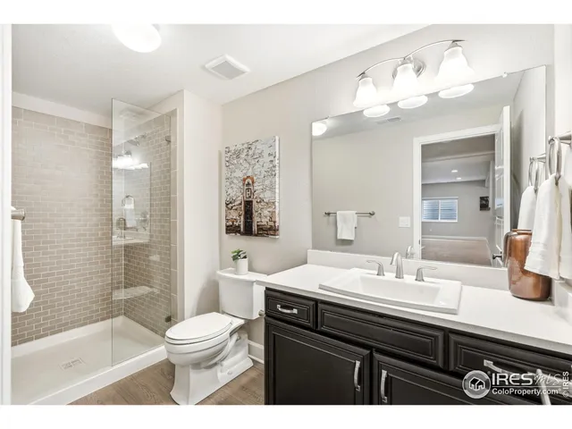 a view of living room with furniture and a rug