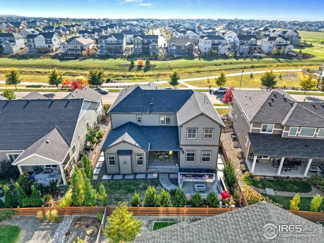 a view of swimming pool with outdoor seating and city view