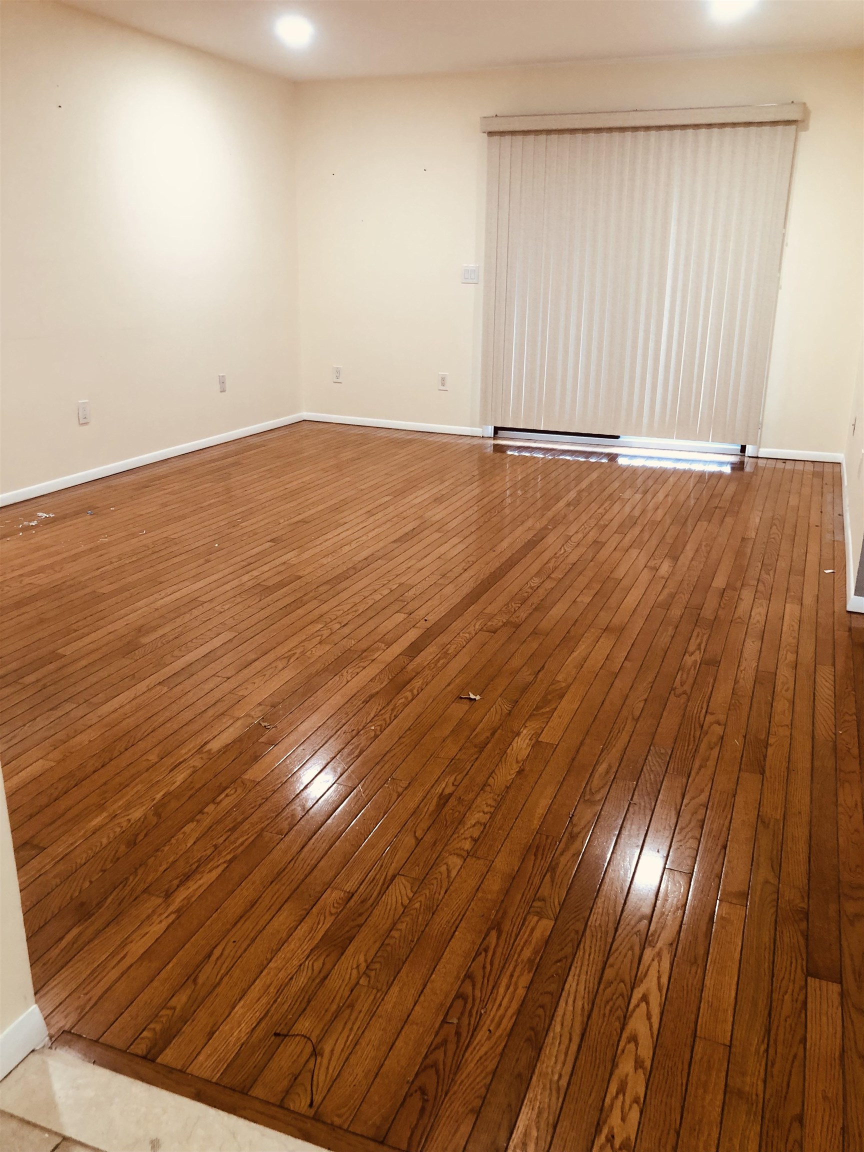 4 Green Valley Court, Unit 4 Secaucus, NJ 07094 - Photo 2 of 10 a view of an empty room with wooden floor