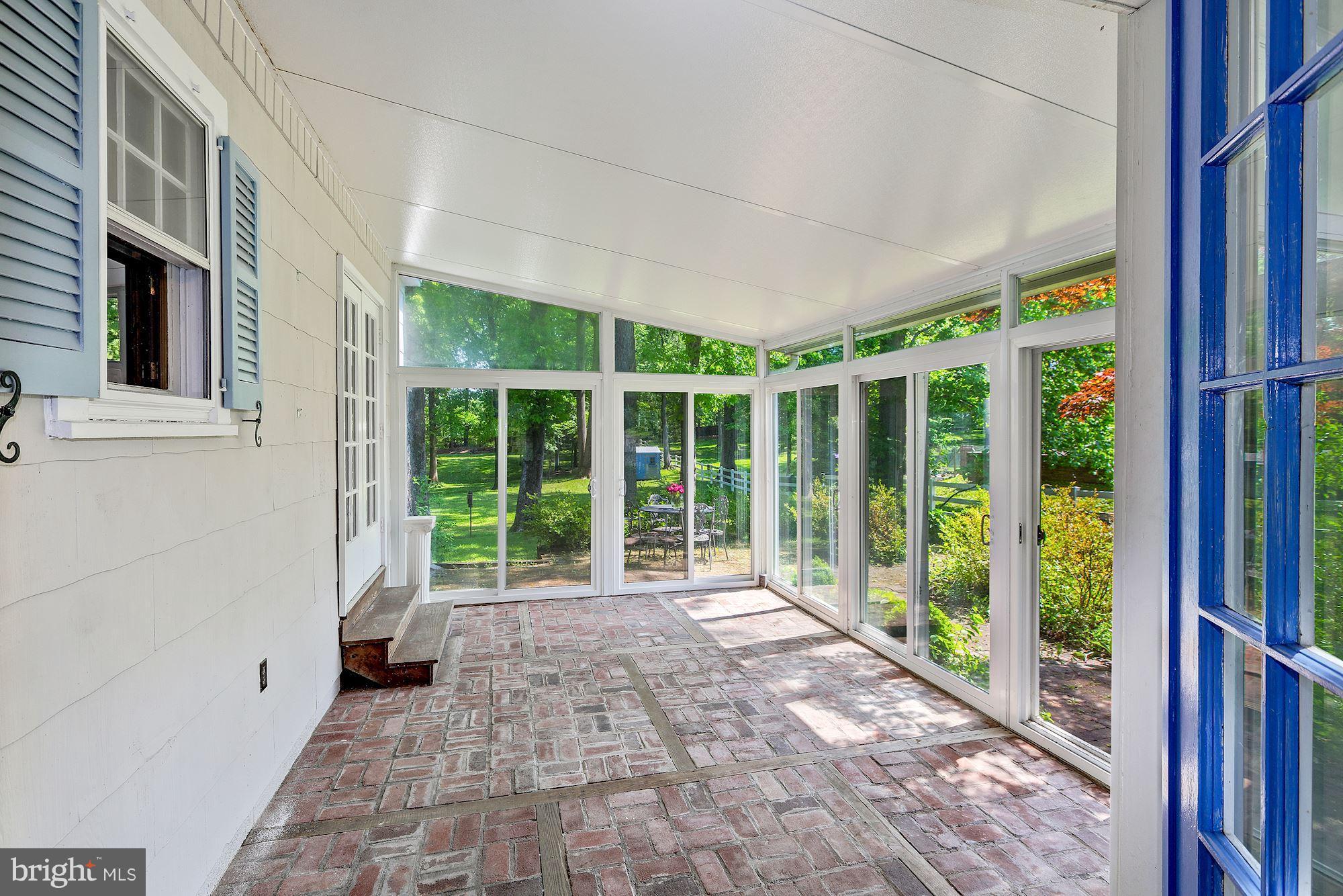 11511 Glen Road Potomac, MD 20854 - Photo 14 of 28 lovely screened porch off of living room