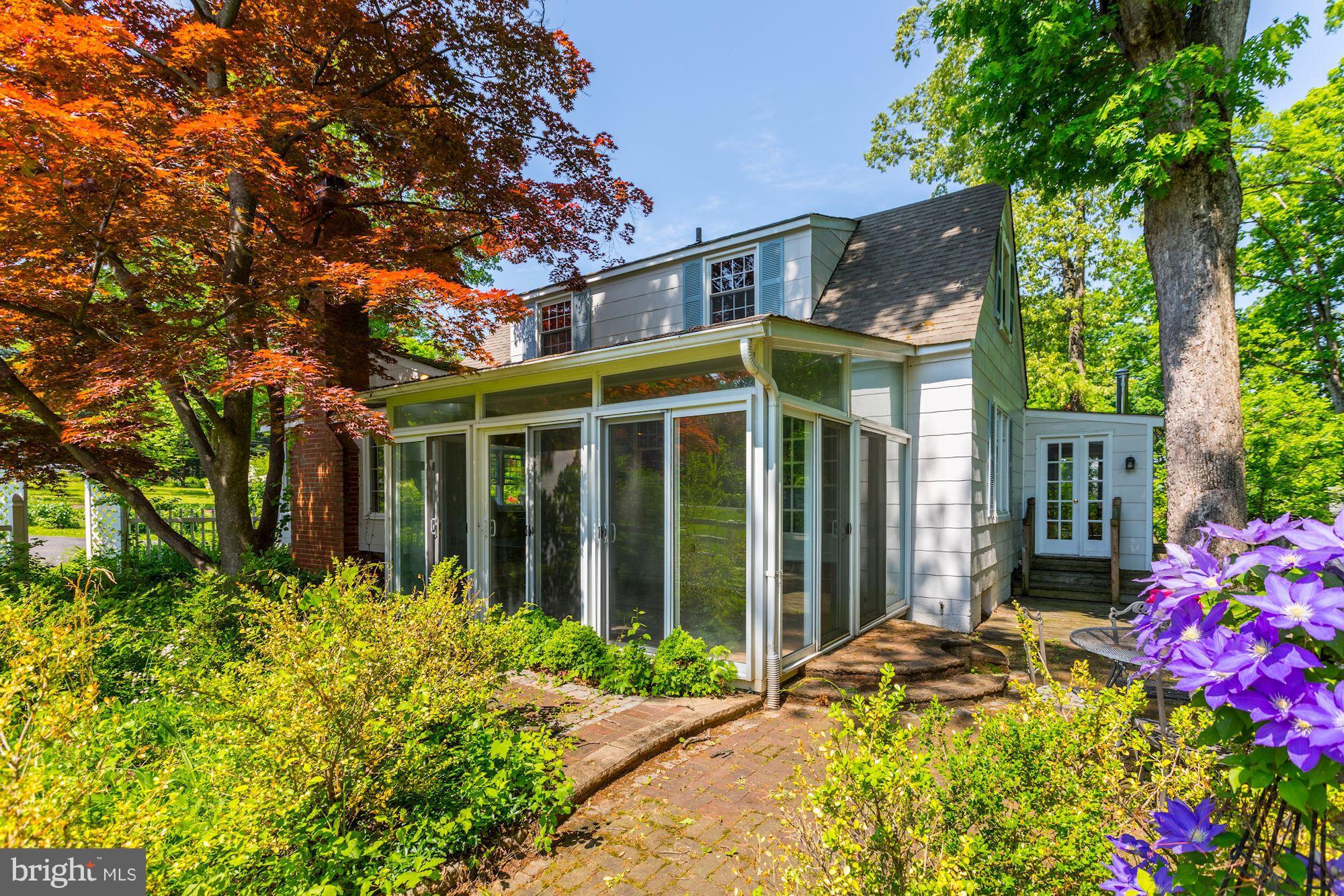 11511 Glen Road Potomac, MD 20854 - Photo 15 of 28 Screened porch opens to patio and deck