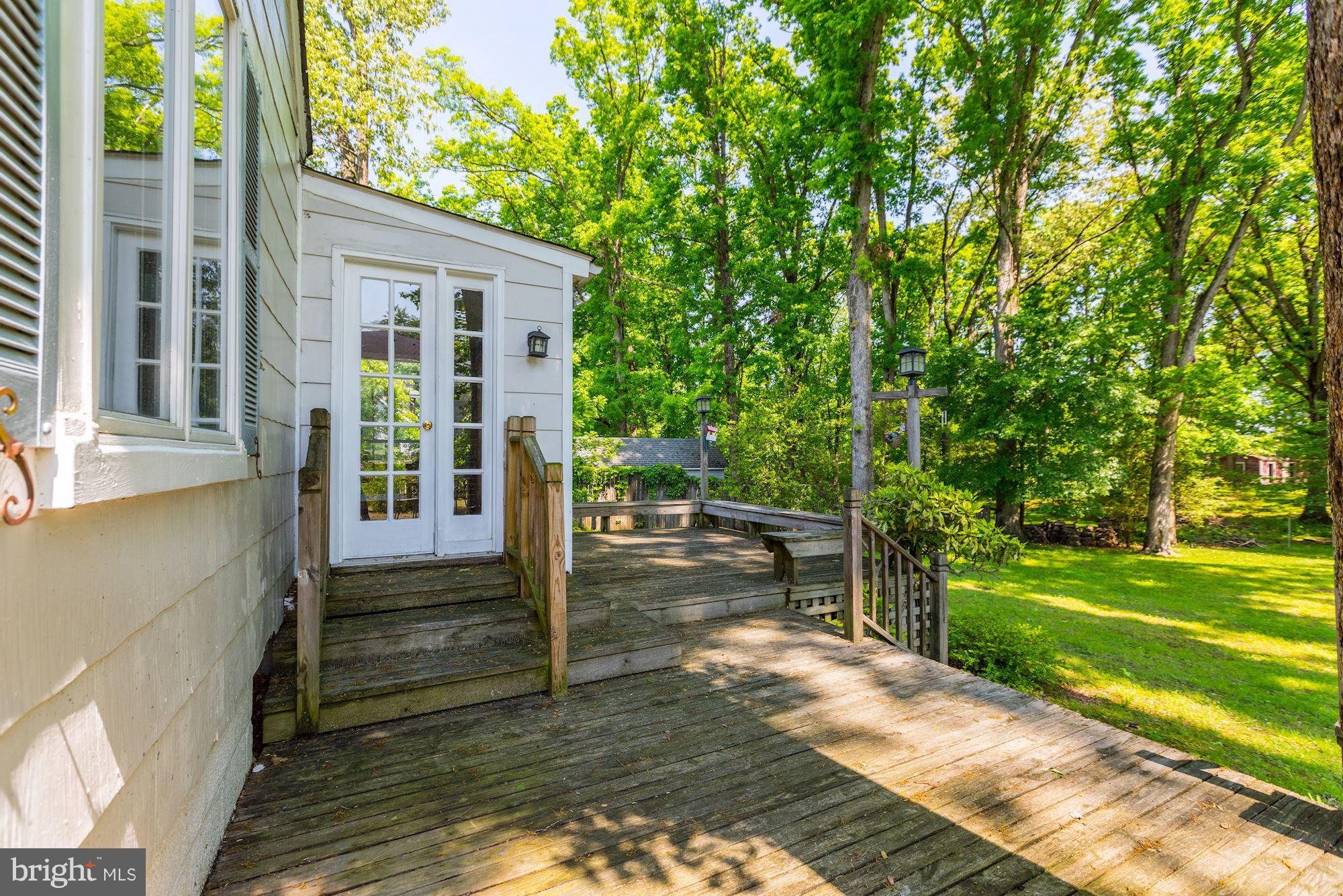 11511 Glen Road Potomac, MD 20854 - Photo 24 of 28 Two tiered back deck looking out on backyard