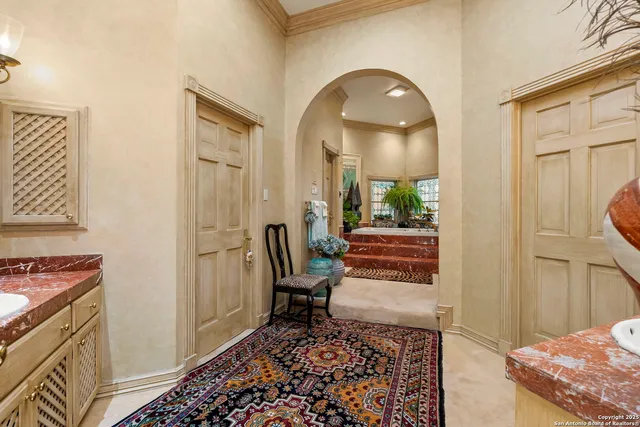 a bath tub sitting in a room next to a window