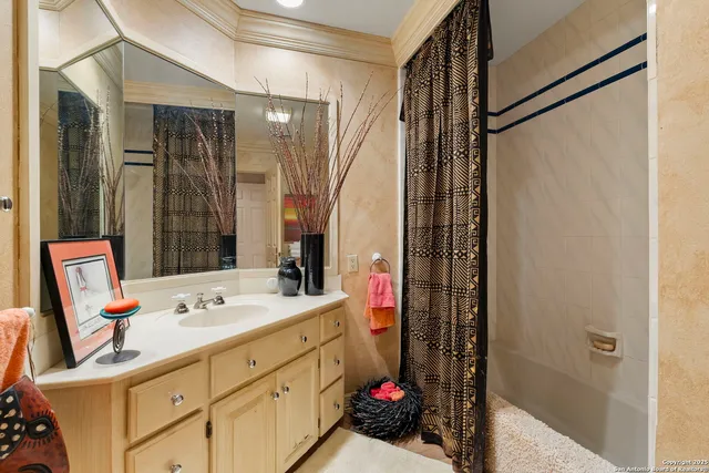 a bed room with furniture and a chandelier